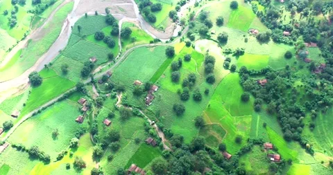 Cinematic High Angle Aerial Move Over Hilly Village Of Western Ghats In India 4K Stock Footage 154861249