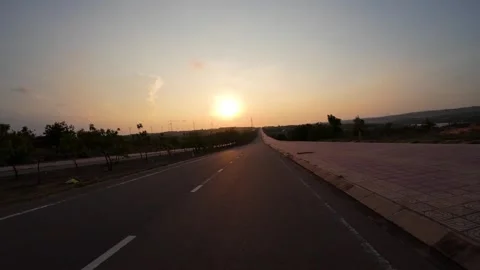 CINEMATIC HIGH ANGLE POV DRIVE ALONG SCENIC ROAD Stock Footage 337606158