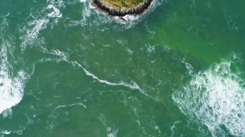 Cinematic high-flying "Nadir" or "Eagle-eye" drone shot, with the camera angled Stock Footage 341095324