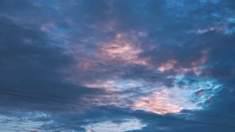 Cinematic hyper lapse of rainy clouds moving in blue sky on cold summer evening  Stock Footage 161370471