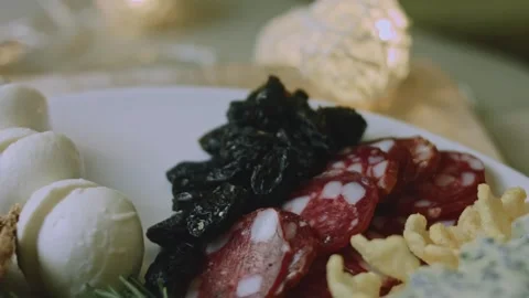 Cinematic intimate preparation of placing nuts among the cheese Stock Footage 342139603