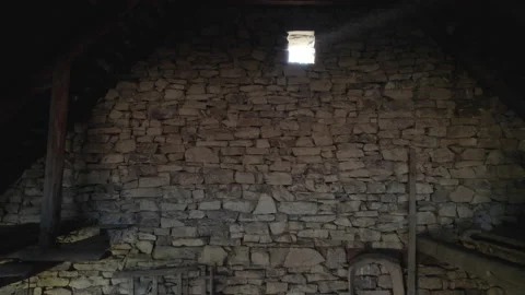 Cinematic light beam in old barn 4k Stock Footage 165690689