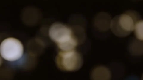 Cinematic Light Bokeh Overlay on Black Background Stock Footage 332352289