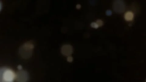 Cinematic Light Bokeh Overlay on Black Background Stock Footage 332352290