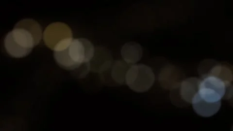 Cinematic Light Bokeh Overlay on Black Background Stock Footage 332352291