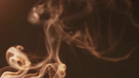 Cinematic light smoke on a dark background moves in different directions and Stock Footage 125318043