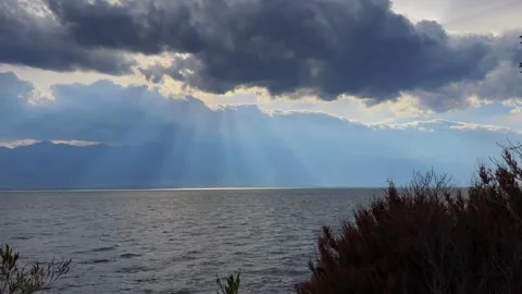 Cinematic Long Take Of Dramatic Dark Storm Clouds Moving Over Erhai Lake In Stock Footage 335254122