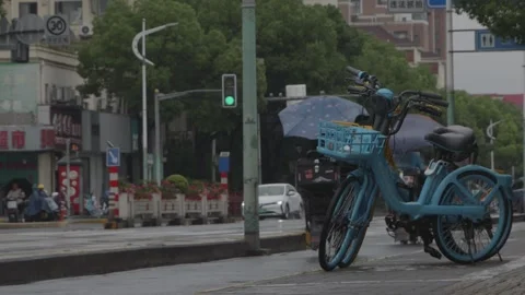 Cinematic Low Angle Slow Motion of Rainy Asian City Commute) Stock Footage 339369574