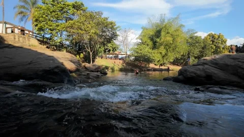 Cinematic low angle slow motion of refreshing river rapids flowing Stock Footage 339604574