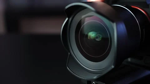 Cinematic macro of camera lens with hood as aperture opens wider, showing Stock Footage 331318387