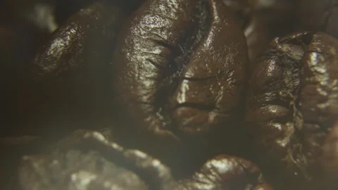 Cinematic Macro of Coffee Beans in Soft Steam. 스톡 동영상 334324796