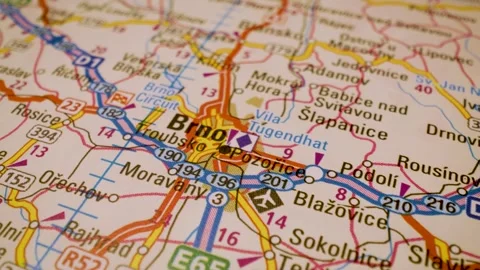 Cinematic macro flight to brno, czech republic, across detailed road atlas map Stock Footage 341269220