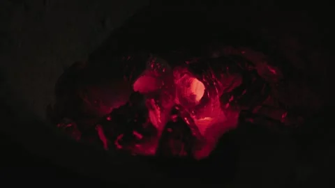 Cinematic Macro Glowing Red Charcoal Fire and Lotus Candles Stock Footage 336952001