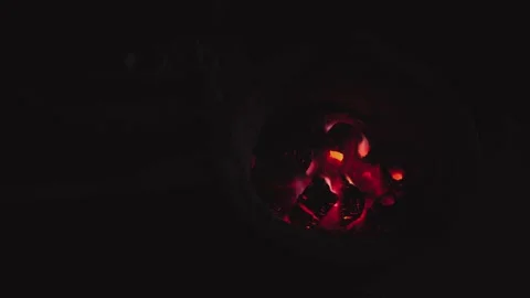 Cinematic Macro Glowing Red Charcoal Fire and Lotus Candles Video stock 336952124