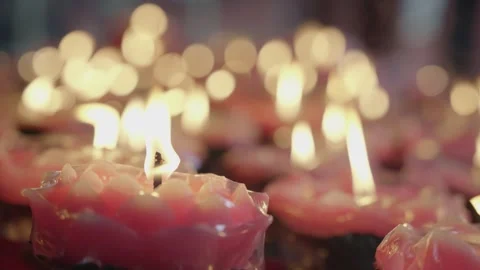 Cinematic Macro Glowing Red Charcoal Fire and Lotus Candles 库存影片 336952254
