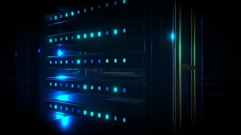 Cinematic macro pan sliding horizontally across illuminated data ports, 4K Video stock 336894914