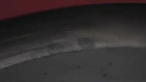 Cinematic macro shot of racing slick tire surface with heat texture Stock Footage 335076415