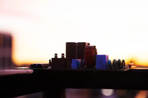 Cinematic Moody Close-up of Electronic Components at Sunset Stock Photos