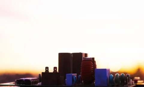Cinematic Moody Close-up of Electronic Components at Sunset Stock Photos