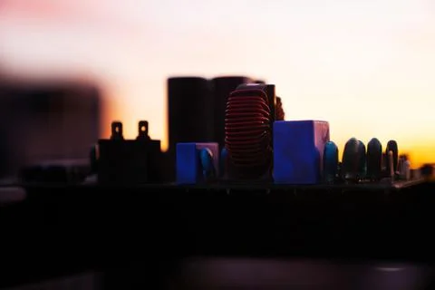 Cinematic Moody Close-up of Electronic Components at Sunset Stock Photos