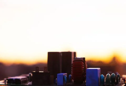 Cinematic Moody Close-up of Electronic Components at Sunset Stock Photos