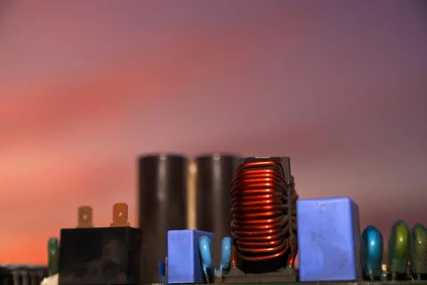 Cinematic Moody Close-up of Electronic Components at Sunset Stock Photos
