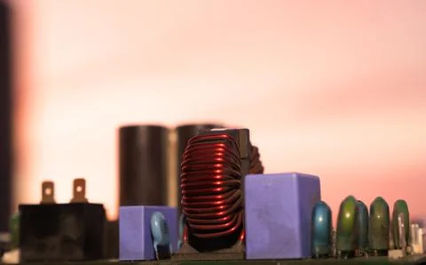 Cinematic Moody Close-up of Electronic Components at Sunset Stock Photos