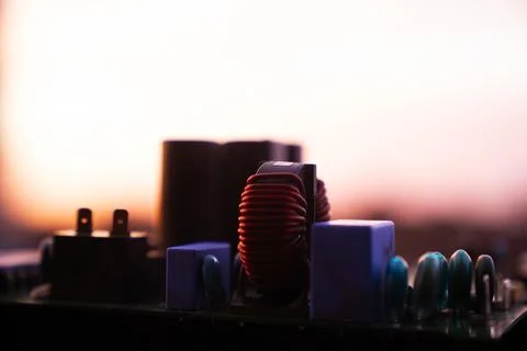 Cinematic Moody Close-up of Electronic Components at Sunset Stock Photos