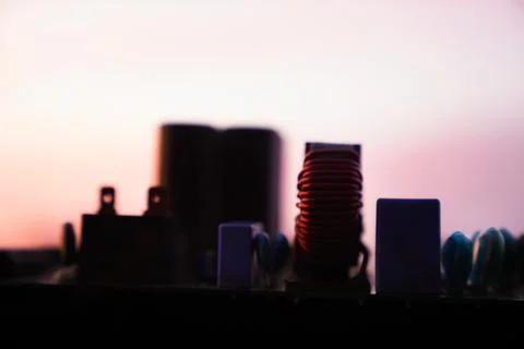 Cinematic Moody Close-up of Electronic Components at Sunset Stock Photos