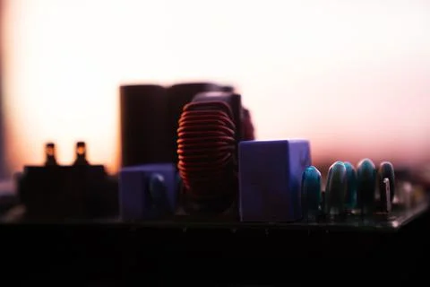 Cinematic Moody Close-up of Electronic Components at Sunset Stock Photos