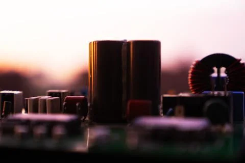 Cinematic Moody Close-up of Electronic Components at Sunset Stock Photos