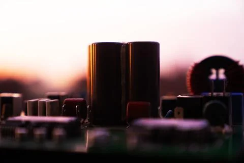 Cinematic Moody Close-up of Electronic Components at Sunset Stock Photos