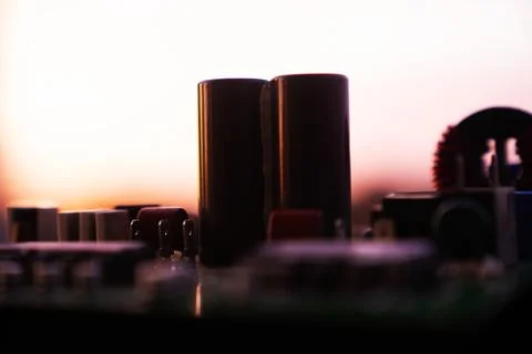 Cinematic Moody Close-up of Electronic Components at Sunset Stock Photos