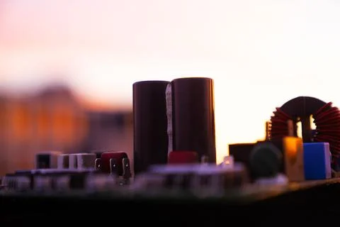 Cinematic Moody Close-up of Electronic Components at Sunset Stock Photos