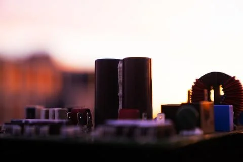Cinematic Moody Close-up of Electronic Components at Sunset Stock Photos