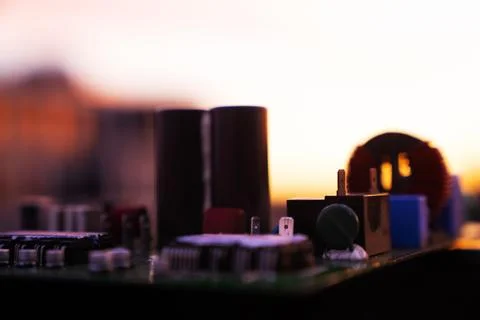 Cinematic Moody Close-up of Electronic Components at Sunset Stock Photos