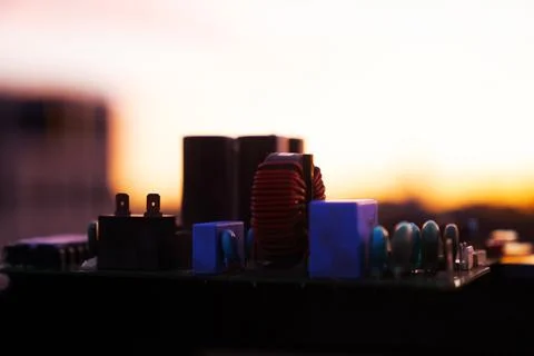 Cinematic Moody Close-up of Electronic Components at Sunset Stock Photos