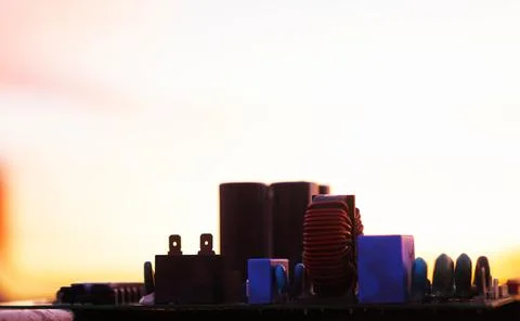 Cinematic Moody Close-up of Electronic Components at Sunset Stock Photos