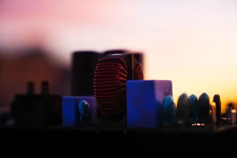 Cinematic Moody Close-up of Electronic Components at Sunset Stock Photos