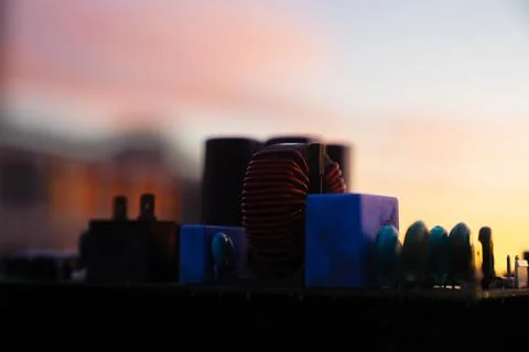 Cinematic Moody Close-up of Electronic Components at Sunset Stock Photos