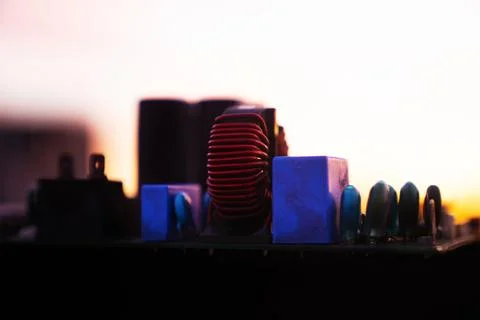 Cinematic Moody Close-up of Electronic Components at Sunset Stock Photos