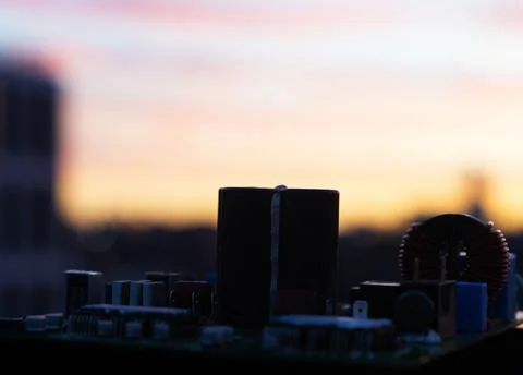 Cinematic Moody Close-up of Electronic Components at Sunset Stock Photos