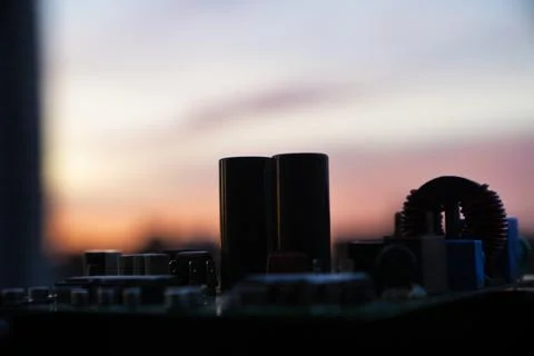 Cinematic Moody Close-up of Electronic Components at Sunset Stock Photos