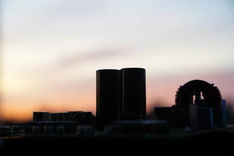 Cinematic Moody Close-up of Electronic Components at Sunset Stock Photos