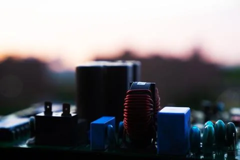 Cinematic Moody Close-up of Electronic Components at Sunset Stock Photos