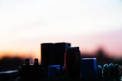 Cinematic Moody Close-up of Electronic Components at Sunset Stock Photos