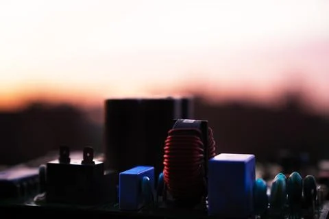 Cinematic Moody Close-up of Electronic Components at Sunset Stock Photos