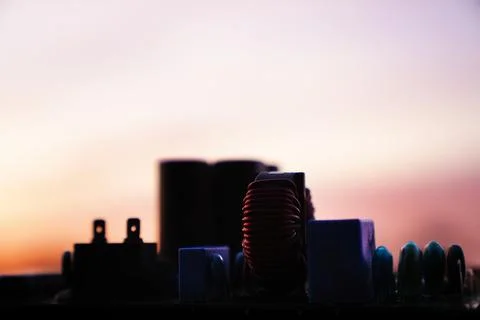 Cinematic Moody Close-up of Electronic Components at Sunset Stock Photos