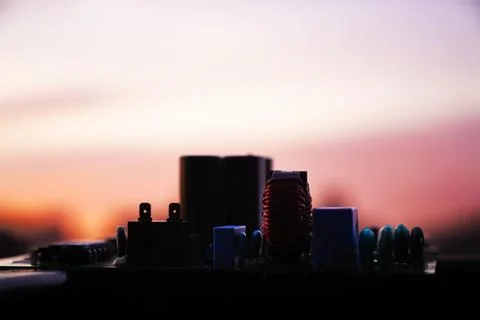 Cinematic Moody Close-up of Electronic Components at Sunset Stock Photos
