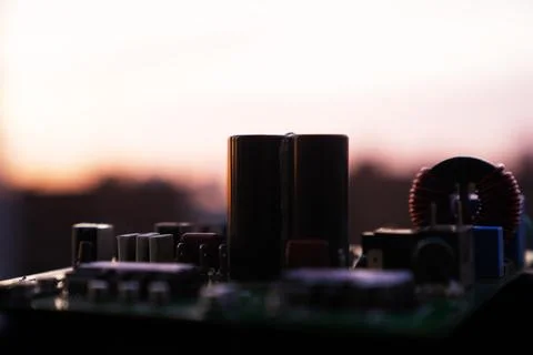 Cinematic Moody Close-up of Electronic Components at Sunset Stock Photos